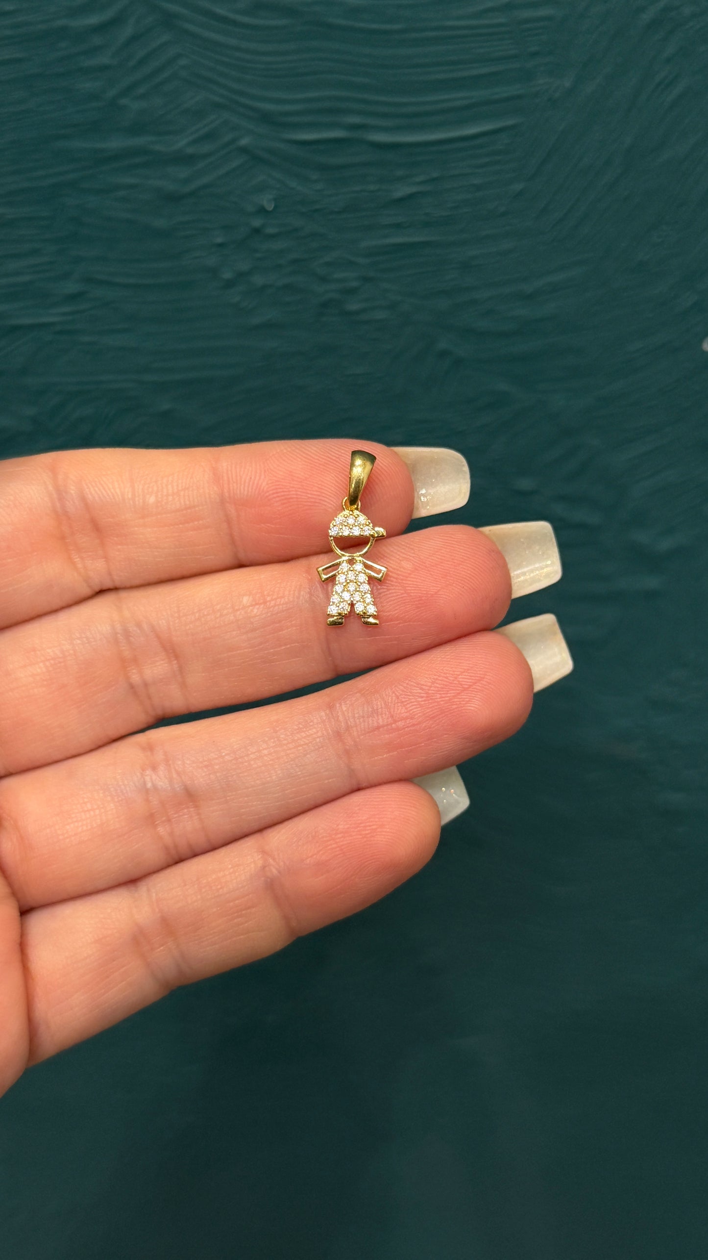 dije niño circones blancos / 0.8 gr