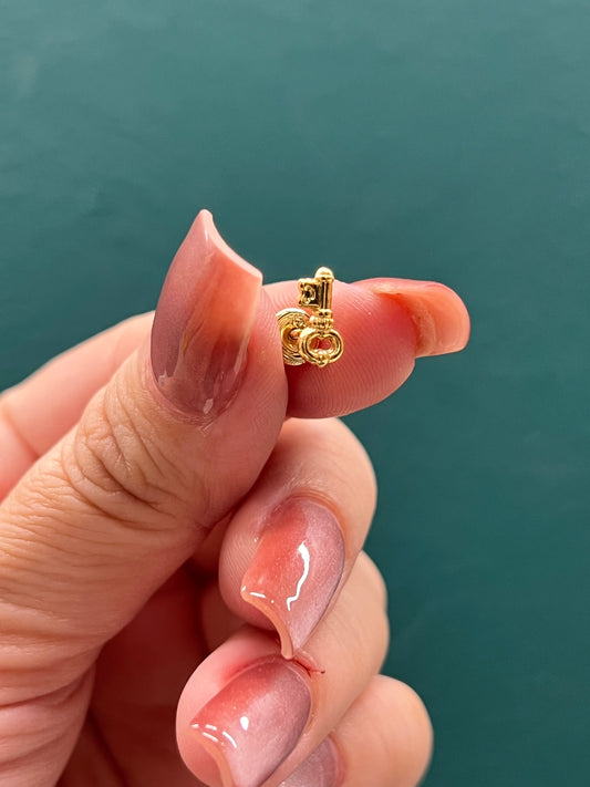 Topos en forma de llave- Oro nacional / 0.8 gr