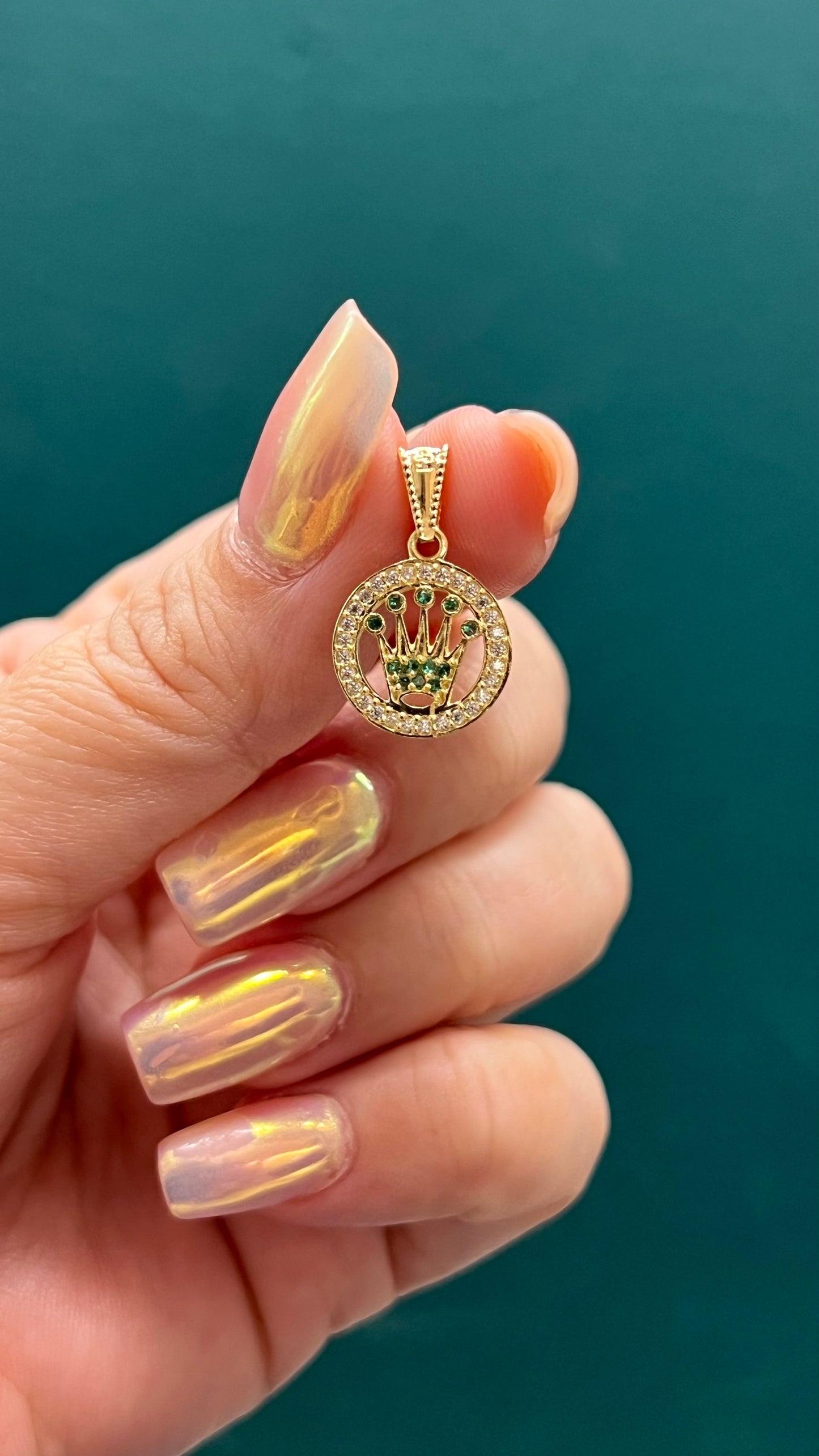 Dije corona RX circones , oro nacional / 1.2 GR