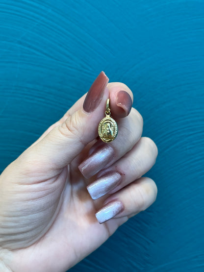 Dije Virgen de coromoto -Oro nacional / 0.7 gr
