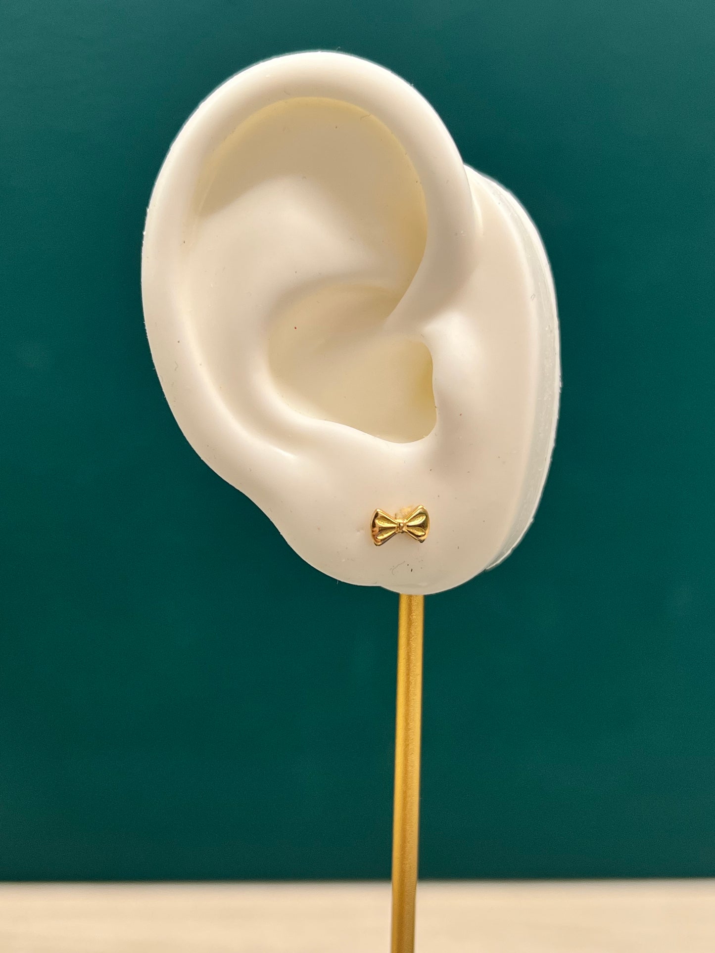Topos en forma de lazo - Oro nacional / 0.7 gr
