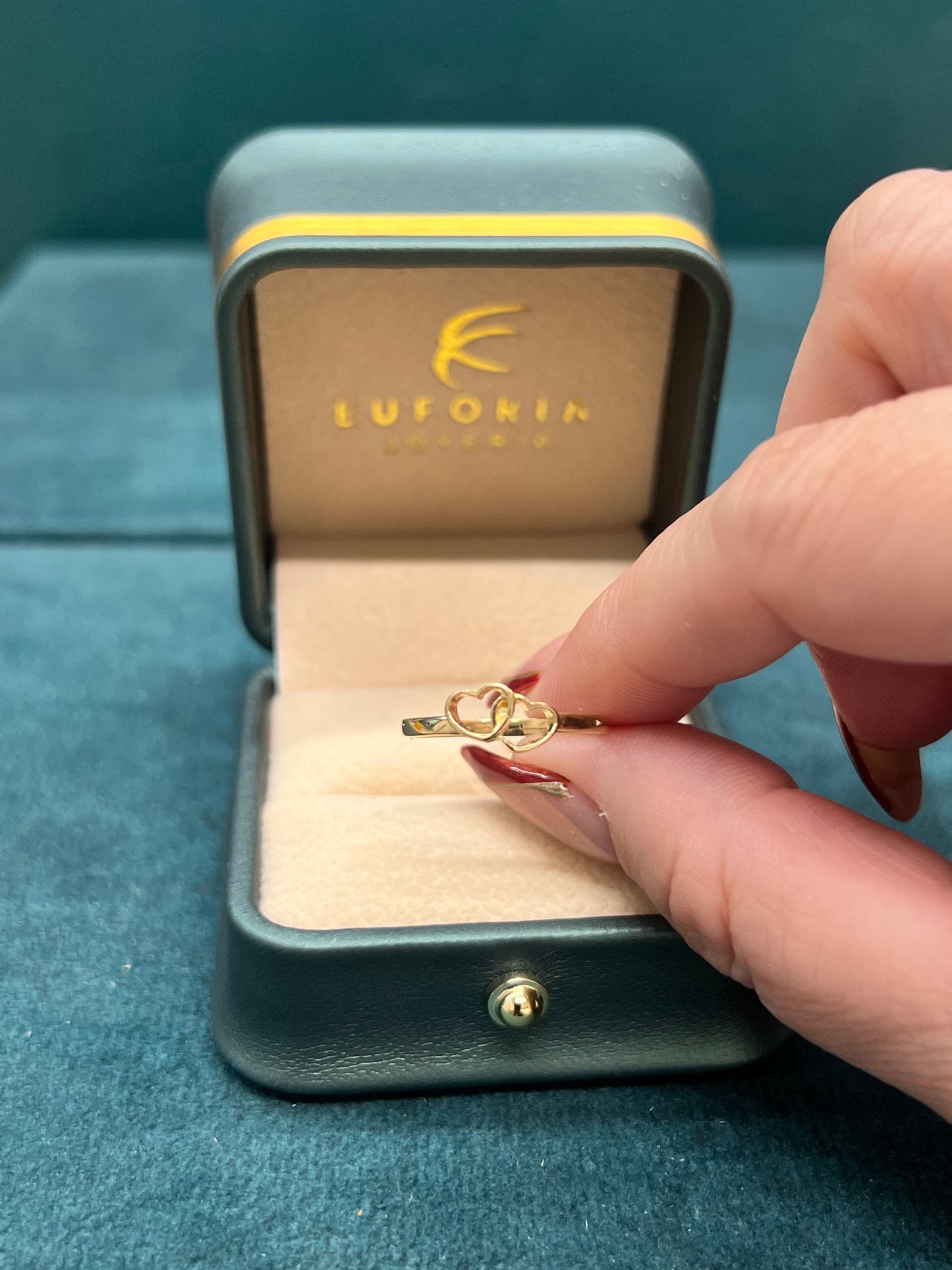 Anillo corazones enlazados / talla 6 ¾ / 1.4 gr / Oro nacional