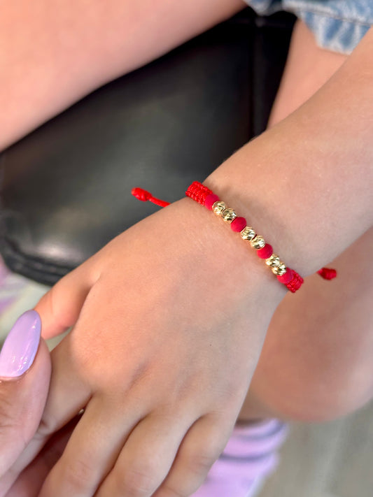 Manilla tejida para niño (a) - balín #4 mm / negra- roja - azul - lila - rosada ( 0.5 gr )